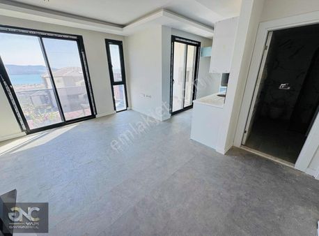 Didim Akbük'te Olimpik Havuzlu Sitede Deniz Manzaralı 2+1 Daire