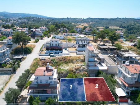 Kuşadası Merkezde Deniz Manzaralı Satılık Villa İmarlı Arsa