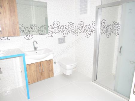 Göçmen Gayrimenkul'den Çarşı Merkezde 2+1 Satılık Daire