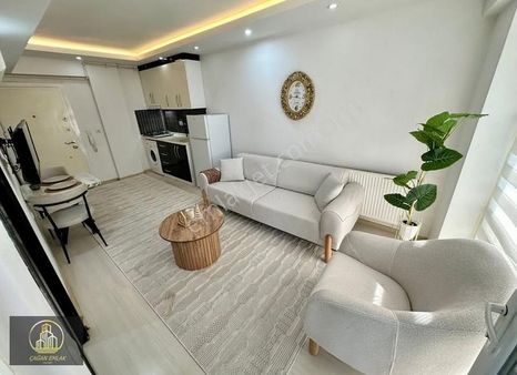 Balkonlu Hazır Kiracılı Cadde Üzeri Yatırımlık 1+1 Satılık Daire