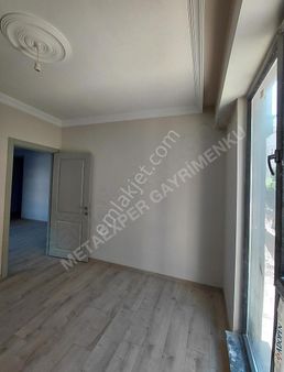 Şehrin Merkezinde Özel Bahçeli 1+1 Satılık Daire