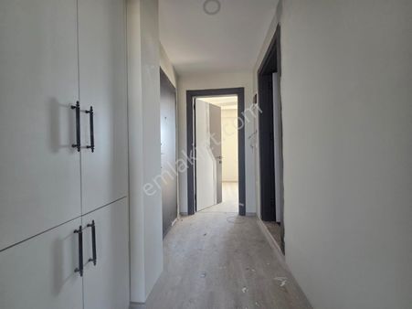 Dalaman Altıntas'ta Asansörlü Binada 1+1 Daire Satılık