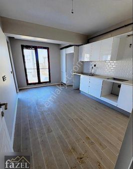 Fazelden İskanlı Özel Garajlı E.banyolu Ara Kat 3+1