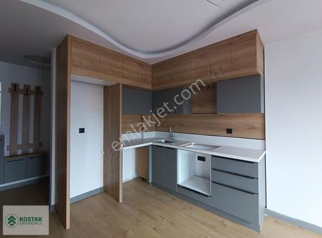 Kostak Gayrimenkul'den Altınkum'da Şık Tasarımlı Sıfır 1+1daire^