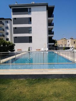 Ada Marka Gayrimenkul'den Kuşadası Değirmendere'de Havuzlu Sitede 2+1 Satılık Daire