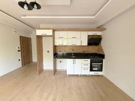 💥💥 Güç Gayrimenkul'den Güre'de Krediye Uygun Geniş Bahçeli Lüx Sıfır Satılık 1+1 Daire