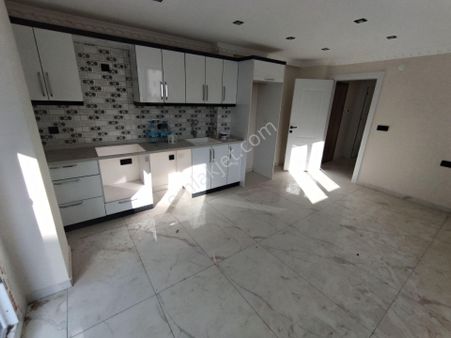 Didim Efeler Mahallesinde Satılık Bahçeli 1+1 Giriş Kat Daire