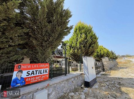 Kuşadasında Havuzlu Sitede Deniz Manzaralı Acil Satılık Villa