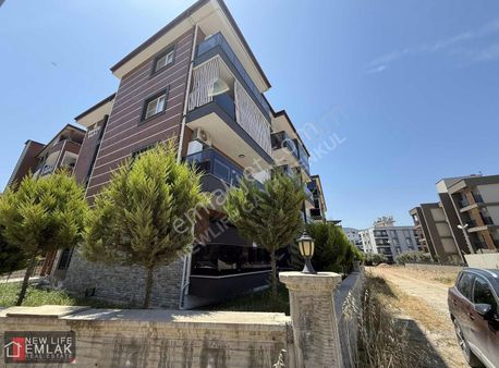 Kuşadası Davutlarda Kapalı Garajlı Satılık Muhteşem 1+1 Daire