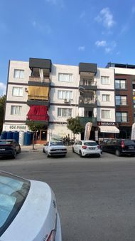 Kuşadası Davutlar Yeni Mahalle De 3+1 Ayrı Mutfak Deniz Manzaralı Çift Balkonlu Uygun Fiyata Satılık