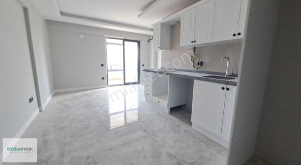 Tozluemlak'tan Deniz Manzaralı Satılık Fırsat 1+1 Daire