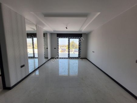 Güzelçamlı'da Deniz Manzaralı Geniş Teraslı Yeni Daire