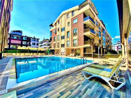 Sezgin Emlak'tan Altınkumda Yüzme Havuzlu & Kapalı Otoparklı Lüx 1+1 Satılık Daire