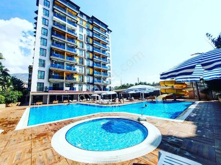 Alanya Saray'da Otel Konseptli Sitede 1+1 Eşyalı Daire | Açık & Kapalı Havuz | Spa Olanakları