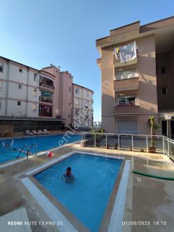 Kuşadası Merkezde 3+1 140m2 Yüksek Giriş Havuzlu Sitede Daire