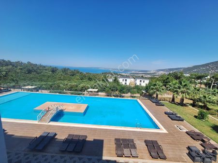 Didim Akbükde Muhteşem Manzaralı Satılık 2+1 Daire Havuzlu Sitede