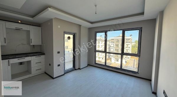 Tozlu Emlak'tan Satılık 1+1 Daire