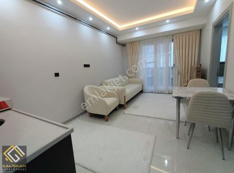 Lozan'da/sıfır/kiracılı/balkonlu/otoparklı/kameralı/yönetimli