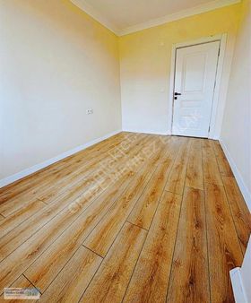 Merkez Emlâk Armağan'dan 2+1 3.kat 100 M2 Otoparklı.