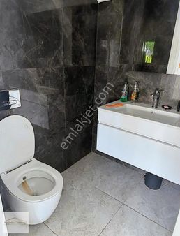 Kuşadası Karaova'da Satılık Havuzlu Büyük Bahçeli 4+1 Lüks Villa