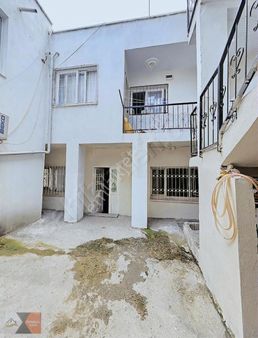 Mersin Gündoğdu'da 2 Katlı 3 Daire 1 Dükkan 200 M2 Müstakil Ev