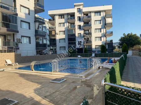 Kuşadası Merkezde Havuzlu Site İçi Müstakil Bahçeli 3+1 Satılık Daire