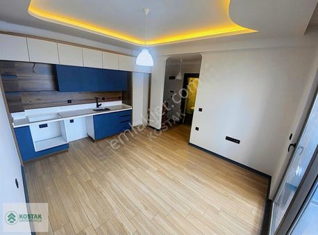 Kostak Gayrimenkul'den Altınkum'da Şık Tasarımlı Sıfır 1+1daire^
