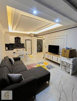 Truva'dan Atakum Gökdelenler Bölgesinde Satılık Eşyalı 1+1 Daire