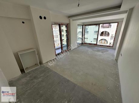 Bostanlı Cemal Gürsel Cadde Üzeri 0 Binada Satılık 2+1daire