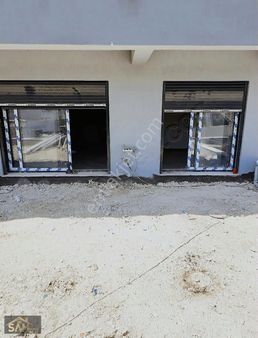 Urla Merkezde Satilik 1+1 Bahçeli Daire