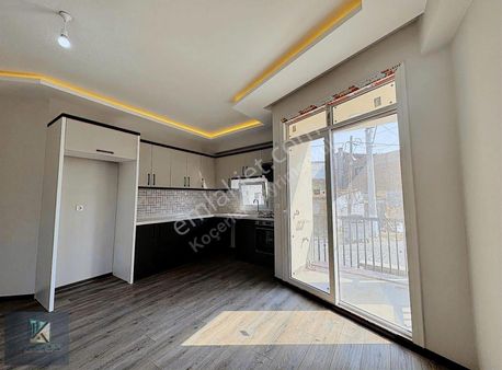 Koçerlerden Zeytinli Merkezde Ön Cephe Sıfır Satılık 2+1 Daire