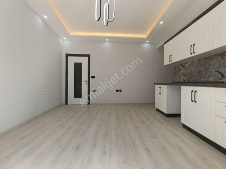 Zeytinlide Müstakil Tadında Geniş Balkonlu Ön Cephe Sıfır 2+1 Daire