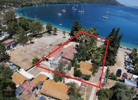 Muğla Akbük Koyu'nda Denize Sıfır Satılık Taş Villa