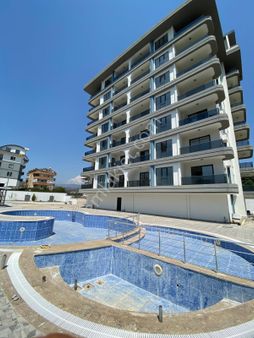 Emlaknomi Alanya-demirtaş Satılık Sıfır 1+1 Arakat Havuzlu Deniz 800 Metre Mesafe