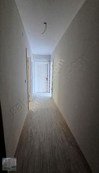 Acill 2+1 Kuşadası Davutlarda Tam Merkezde Satılık Daire