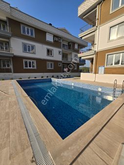 Çiğdem Emlak'tan Dalaman'da Havuzlu Satılık 1+1 Daire
