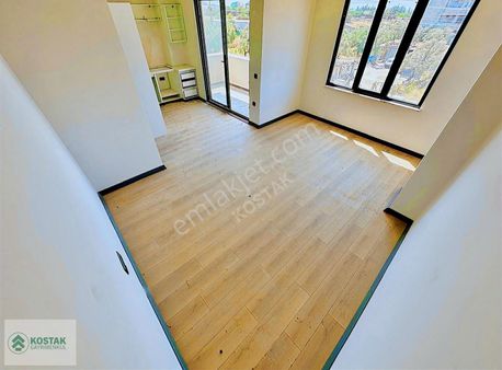 Kostak Gayrimenkulden Zeytinlide Ön Cephe Arakat Sıfır 1+1 Daire