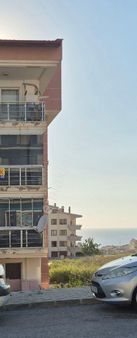 Kuşadası Ege Mahallesinde Deniz Manzarali 100 M2 3+1 Daire