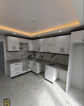 Sünbül Emlak'tan Ö. Garajlı İskanlı Sıfır 3+1 Daire