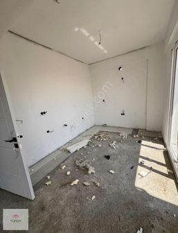 Fethiye'nin Çamköy Mahallesi'nde Satılık 2 + 1 Giriş Kat Daire