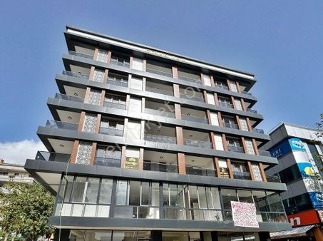 Reşit Paşa Cadde Üzeri Çift Balkonlu Sıfır Bina 2+1 Büyük Tip