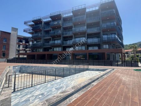 Kuşadası Güzelçamlı-sahile Yakın-satılık-daire 1+1