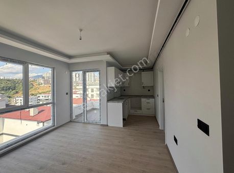 **toplukonut Bulvarına Cephe Satılık 1+1**