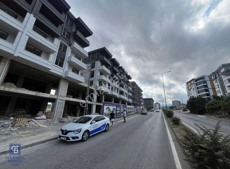 Toplu Konut Bulv.na Cephe,denız Ve Yol Manzaralı,sıte Icı 1+1