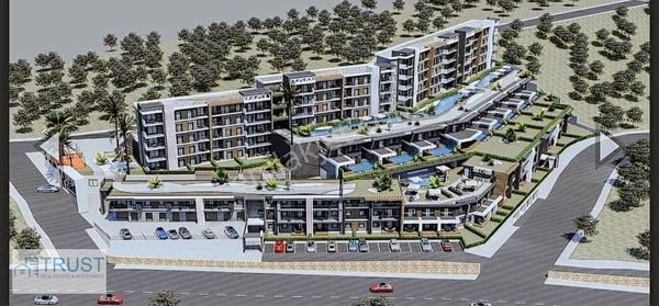 Kuşadası Merkezi Konumda Havuzlu Site Satılık 2+1 Bahçeli Daire