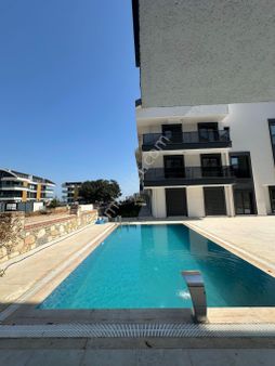Didim Altınkum'da Denize Yürüme Mesafesi'nde 2+1 Havuzlu Lüks Satılık Daire