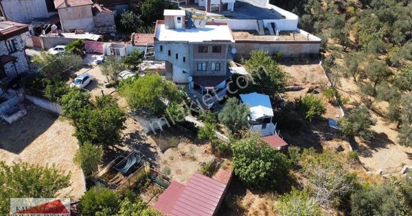 Kavuşturan Emlak'tan Güre Çamlıbel'de Satılık 1.500 M2 Arsa İçerisin'de Müstakil Ev