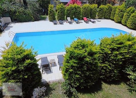 Bodrum Asarlık'ta Deniz Manzaralı Kendine Ait Plajı Olan Daire