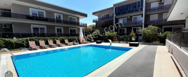 Yenifoça Defne Sitesi İçerisinde Satılık Bahçe Katı 1+1 Daire
