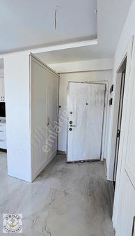 Yatay Mimari Konsept Projede Geniş Teras Bahçeli 1+1 Daireler